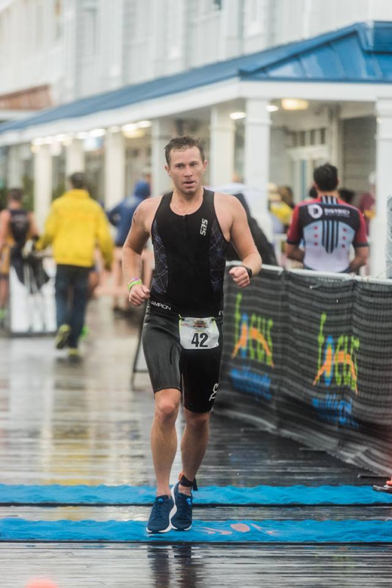 Bethany Beach First Responders Triathlon (2) - pouring rain finish line